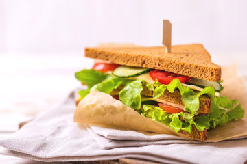 Rye bread sandwich with ham, cheese, lettuce