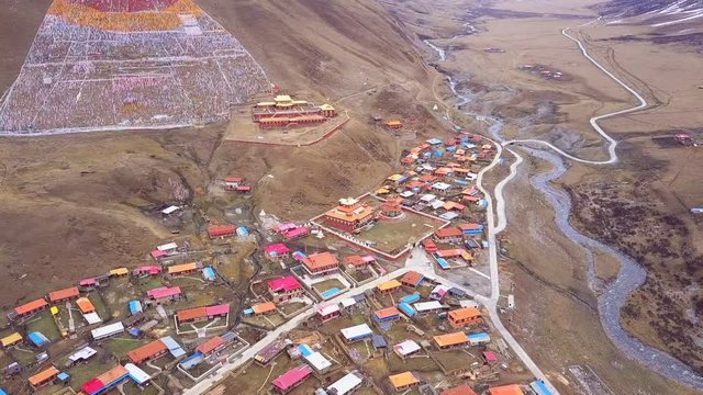 Aerial view of Tibetan Monastery and small village in Kanze, Sichuan, China
