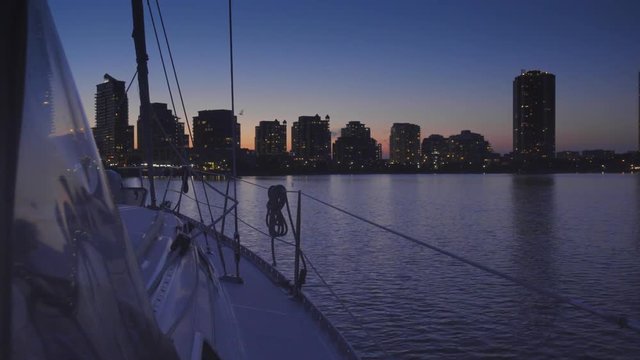 sailboat in summer on the lake ontario toronto sunset
