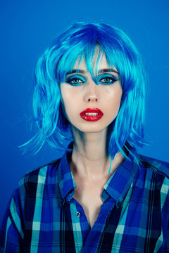 woman with blue hair wig and fashionable makeup