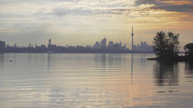 sailboat in summer on the lake ontario toronto sunset