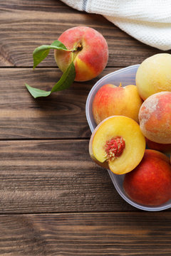 Peaches on the wooden table