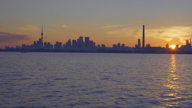 sailboat in summer on the lake ontario toronto sunset