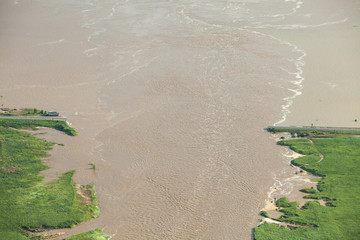 Hochwasser zerstört Straße