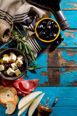 Tasty appetizing italian Mediterranean Food Ingredients Flat Lay on Blue Old Rustic Background Top View Copy Space Above