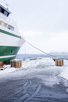 A Norwegian fishing boat parked in the port of Ålesund, Norway