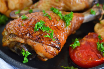 Grilled chicken with pesto sauce and vegetables.
