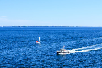 Pilot boat Past Sailboat