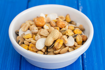 salted nuts and seeds on white dish