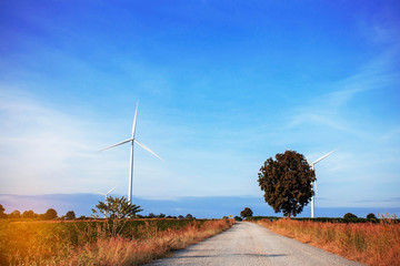 wind turbines farm with the blue sky.