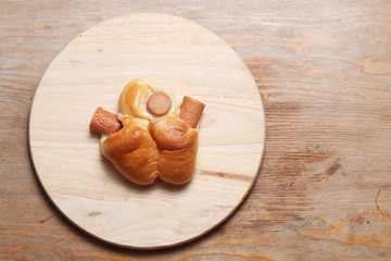 sausage bread on wood background