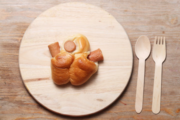 sausage bread on wood background