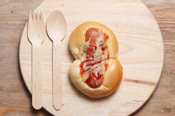 sausage bread on wood background