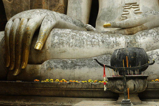 Hand of statue of buddha,in the historical park of Sukhothai,Thailand 