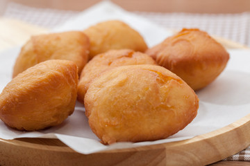 Chinese fried Dough bun on wooden plate