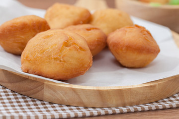 Chinese fried Dough bun on wooden plate