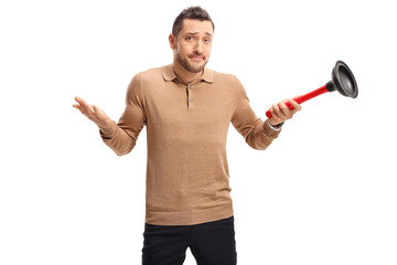 Confused guy holding a plunger