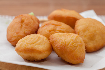 Chinese fried Dough bun on wooden plate