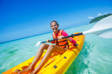 Beautiful Girl With Kayak Paddle