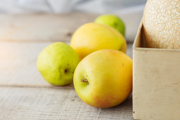 Green apples on wooden.