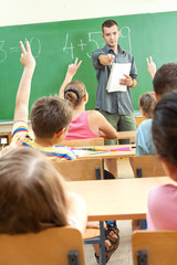 Elementary School Students at Classroom Desks