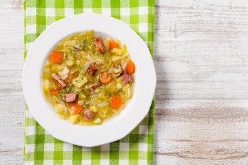Homemade cabbage soup, cooked on smoked ribs.
