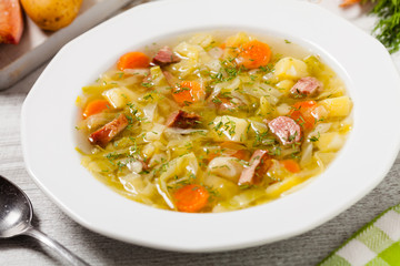 Homemade cabbage soup, cooked on smoked ribs.
