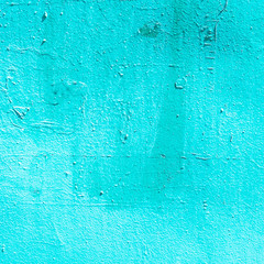 Old grunge cyan painted wall