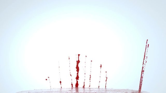 Blood or wine splashes with slow motion. Alpha. 3d render, animation