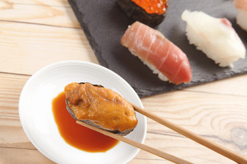 Sea urchin sushi closeup - 166980797