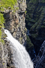 Obraz premium Mountain landscape in Norway, a snowy mountain, nature, Northern Norway, waterfall