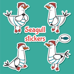 Four bird seagull stickers isolated on blue background