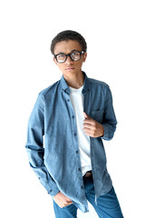 serious african american teenage boy in eyeglasses looking at camera isolated on white