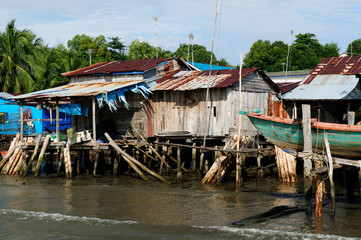 Fototapeta na wymiar Houses on stilts in Cambodia 