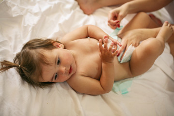 Mother with her baby at home.