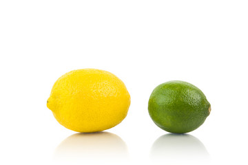 Fresh Lemon And Green Lime Isolated On White Background With Reflection