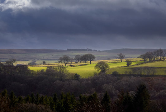 Sun breaking through the cloud over English Farmland, Muggleswick Common near Edmundbyers, England, UK.