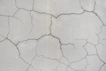 Gray cracked wall, texture or background