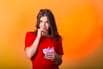 Beautiful woman with present box