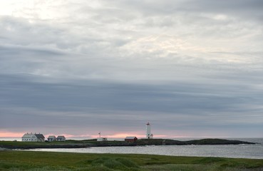 Fototapeta na wymiar Kjolnes coast with lighthouse in Northern Norway