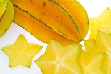 Star fruit on white isolated background translucent delicious natural sweet shape starfruit food texture detail macro close up carambola graphic pattern