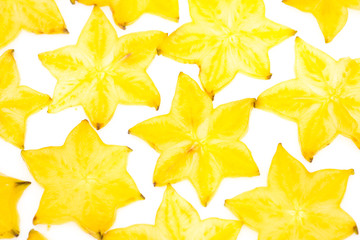 Star fruit on white isolated background translucent delicious natural sweet shape starfruit food texture detail macro close up carambola graphic pattern