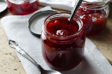 Homemade Strawberry Jam on a Wooden Table