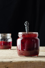 Homemade Strawberry Jam on a Wooden Table