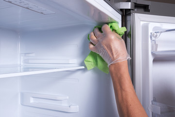 Hand cleaning refrigerator.