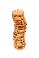 Round biscuits with chocolate filling on a white background