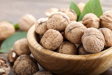 Walnuts on a wooden background