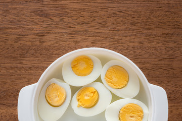 Eggs boiled on wooden table.