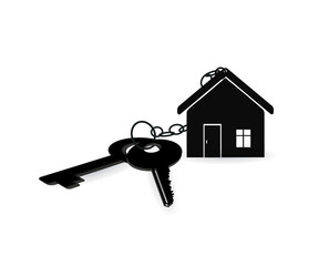 House key on a house shaped keychain. concept for real estate, moving home or renting property