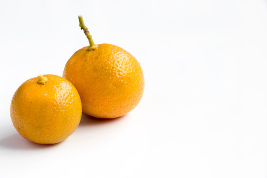 Orange color of Kumquat on white background